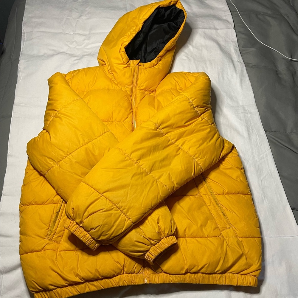 Yellow puffer jacket